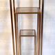 Pull-out harnesses in gilded brass and smoked glass.