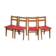 Vintage chairs from the 1950s in wood and faux leather.