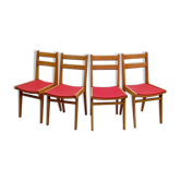 Vintage chairs from the 1950s in wood and faux leather.