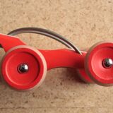 Jouet en bois E Racer Hape formule 1 en bambou rouge