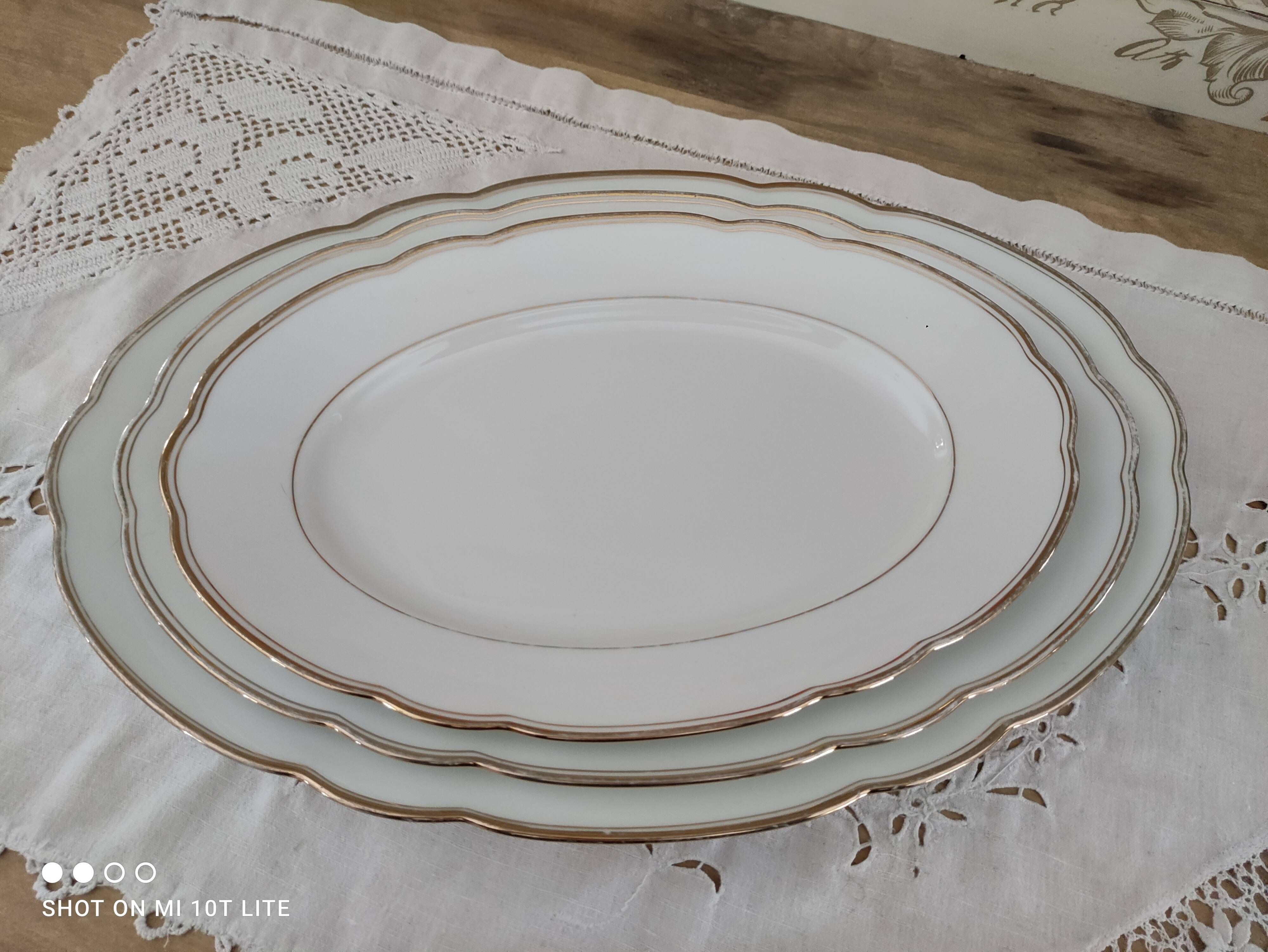 Oval plate in white Swiss porcelain double gilded border "VSK USC Viribus Unitis"