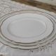 Oval plate in white Swiss porcelain double gilded border "VSK USC Viribus Unitis"