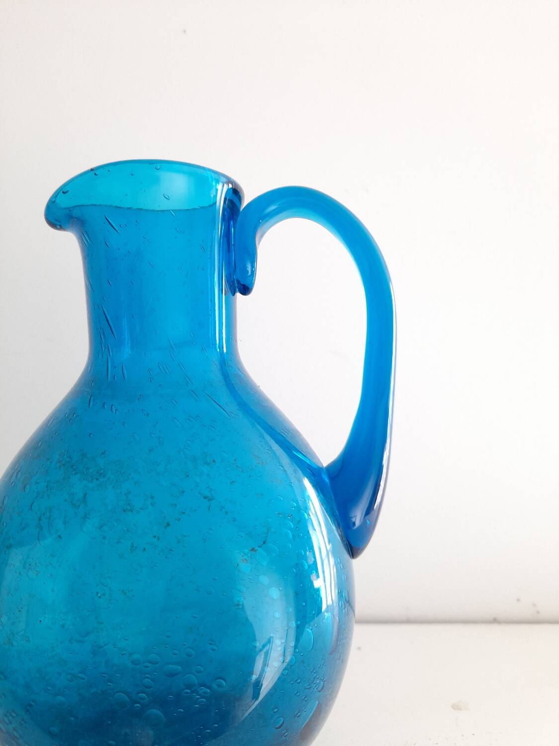 Blue blown glass pitcher