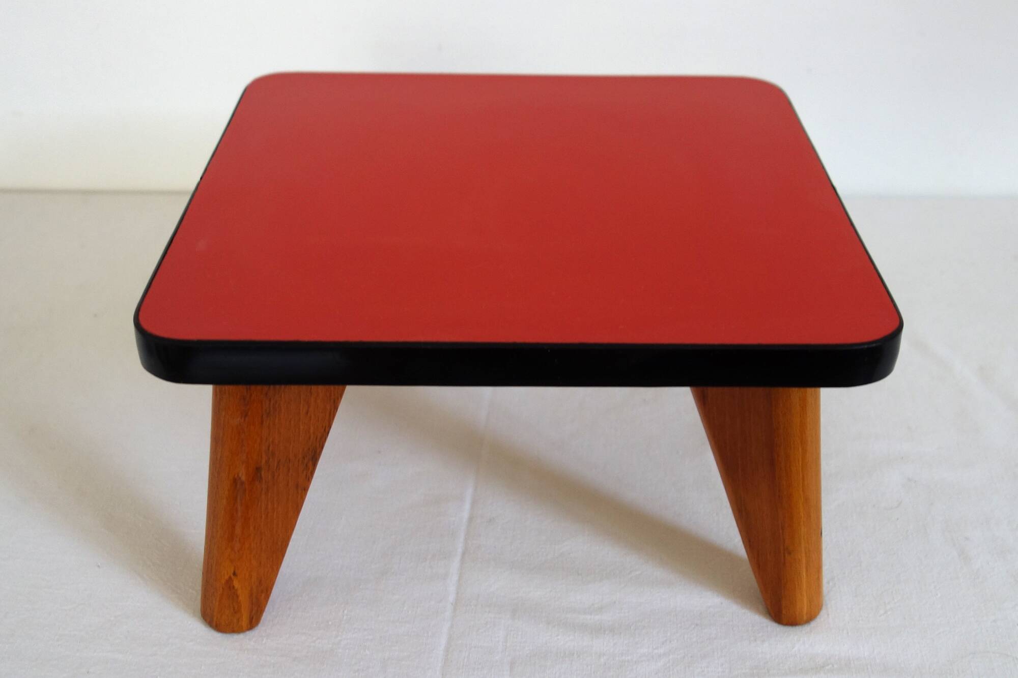 Mini vintage red formica pedestal table or stool