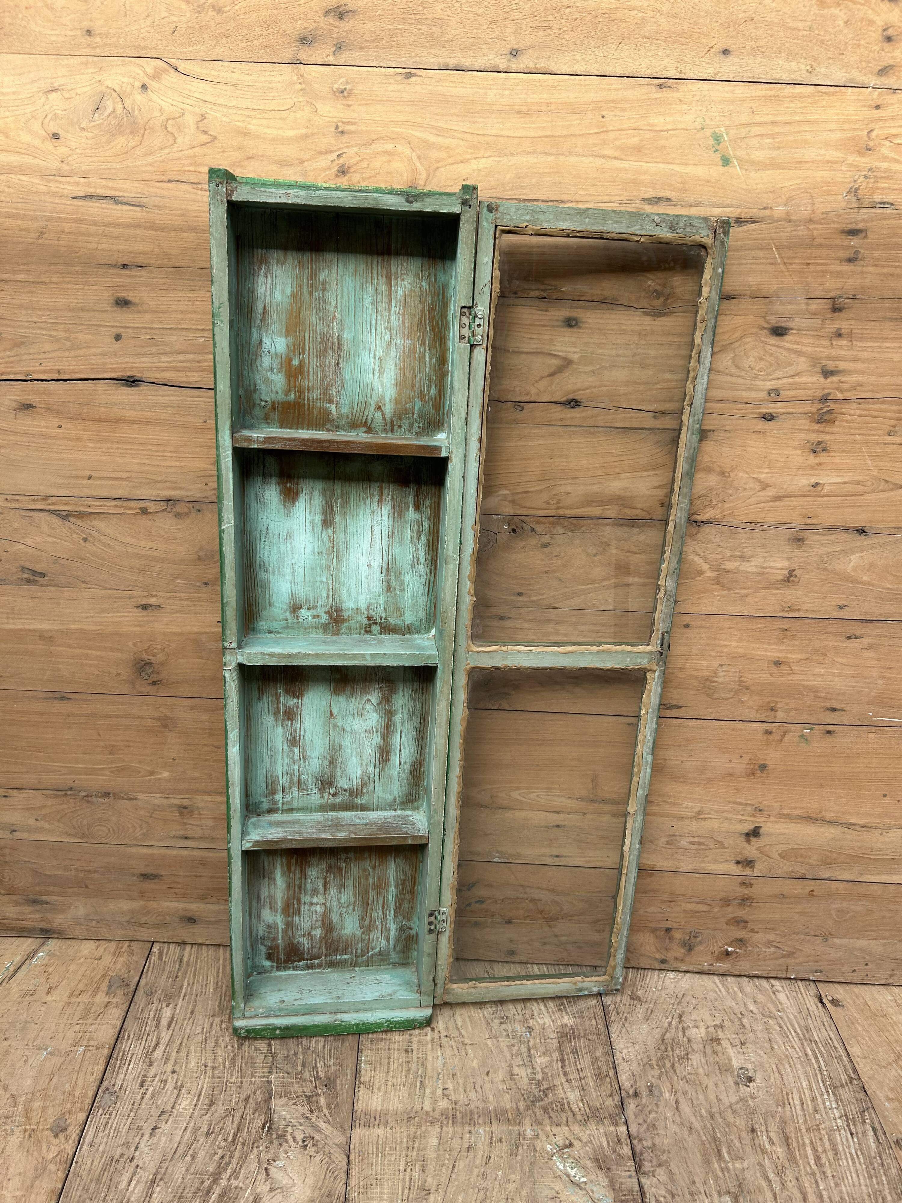 Wall display cabinet in Burmese teak with original patina.