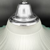 Frosted glass flower pendant with a water green edge.