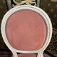 Suite de 4 chaises style Louis XVI médaillon