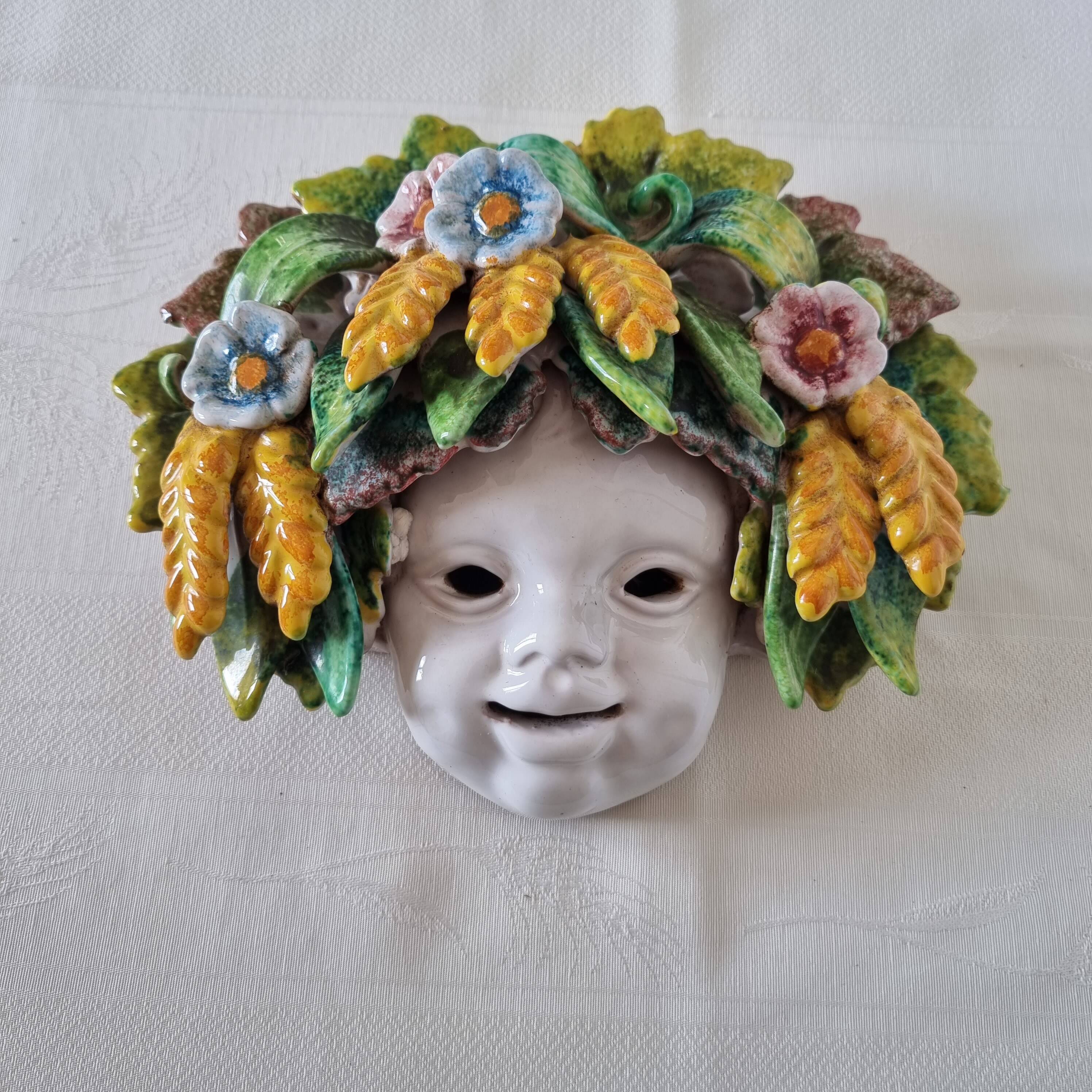 Vintage Italian ceramic wall mask, handmade, decorated with floral details