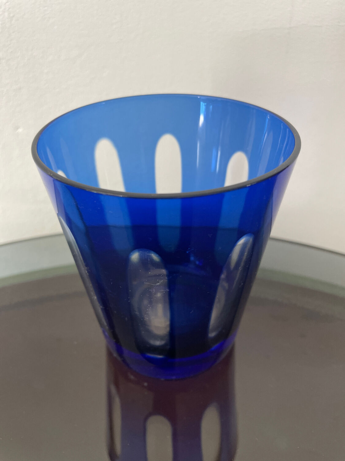 Antique crystal glass lined blue.