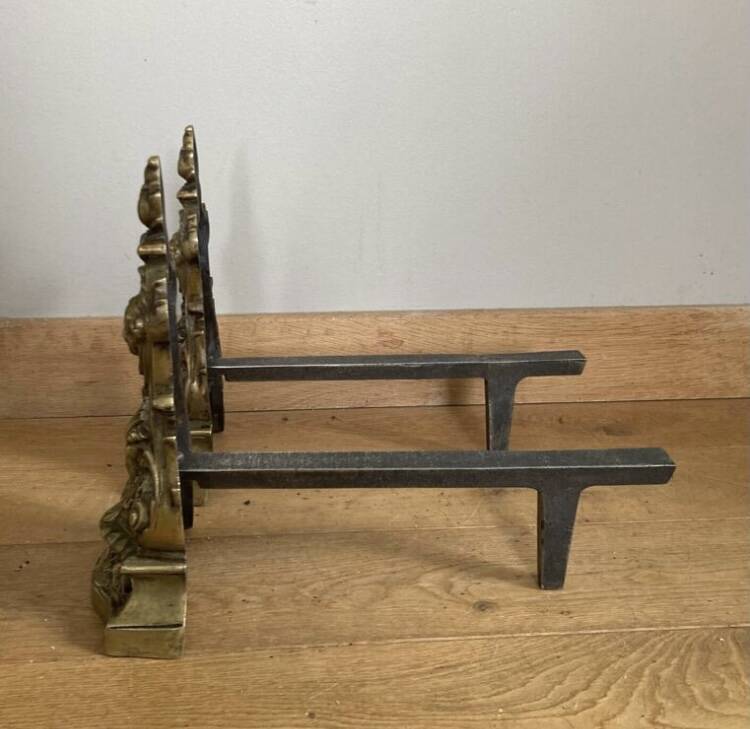 Pair of Louis XV andirons in solid bronze, early 20th century