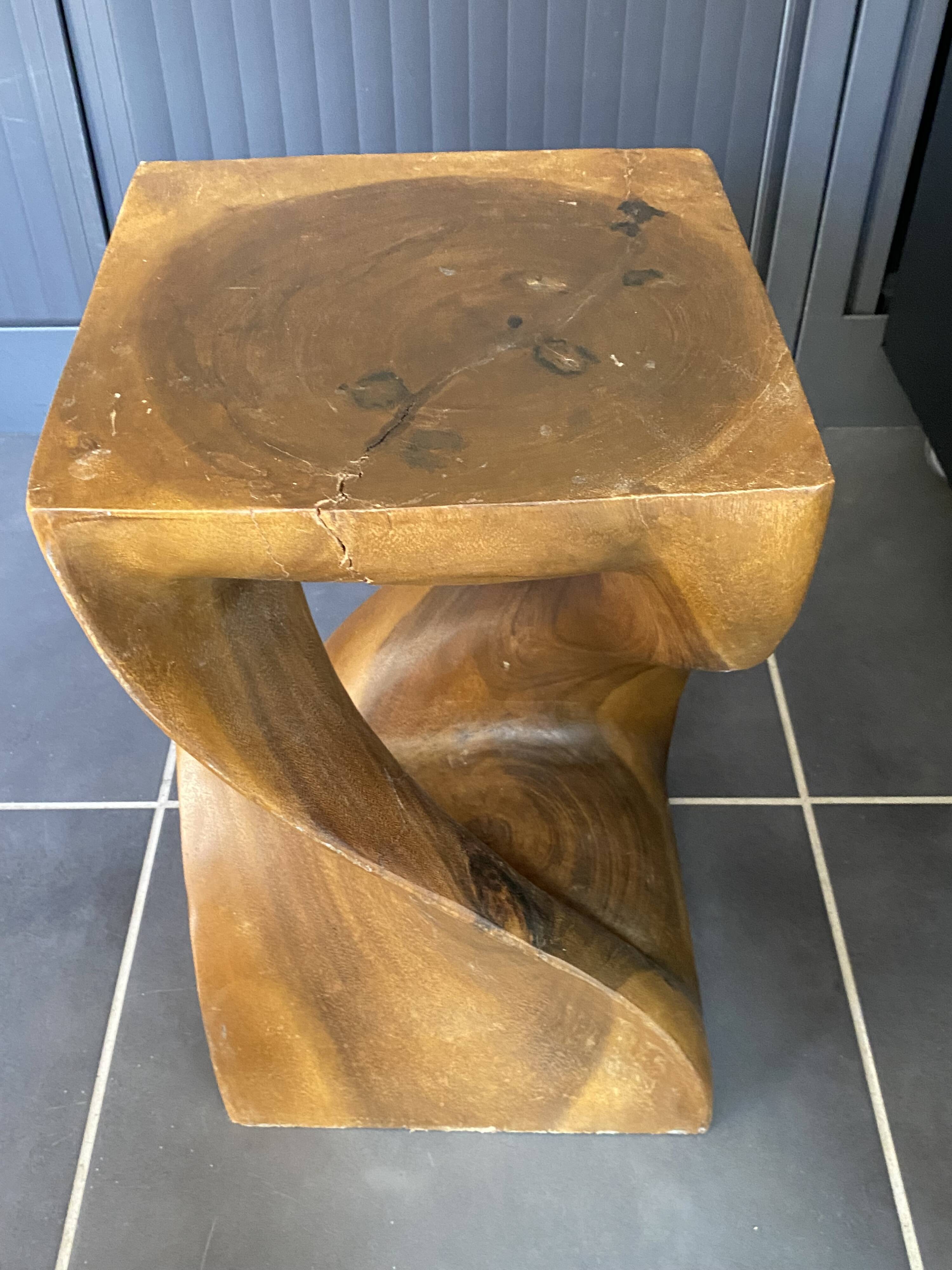 Stool n2 in solid raw walnut wood carved from the mass 1970