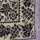 Romanian floral rug handwoven in wool, yellow and black background