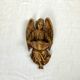 Old wooden angel font