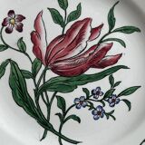 5 plates with colorful Sarreguemines floral designs.