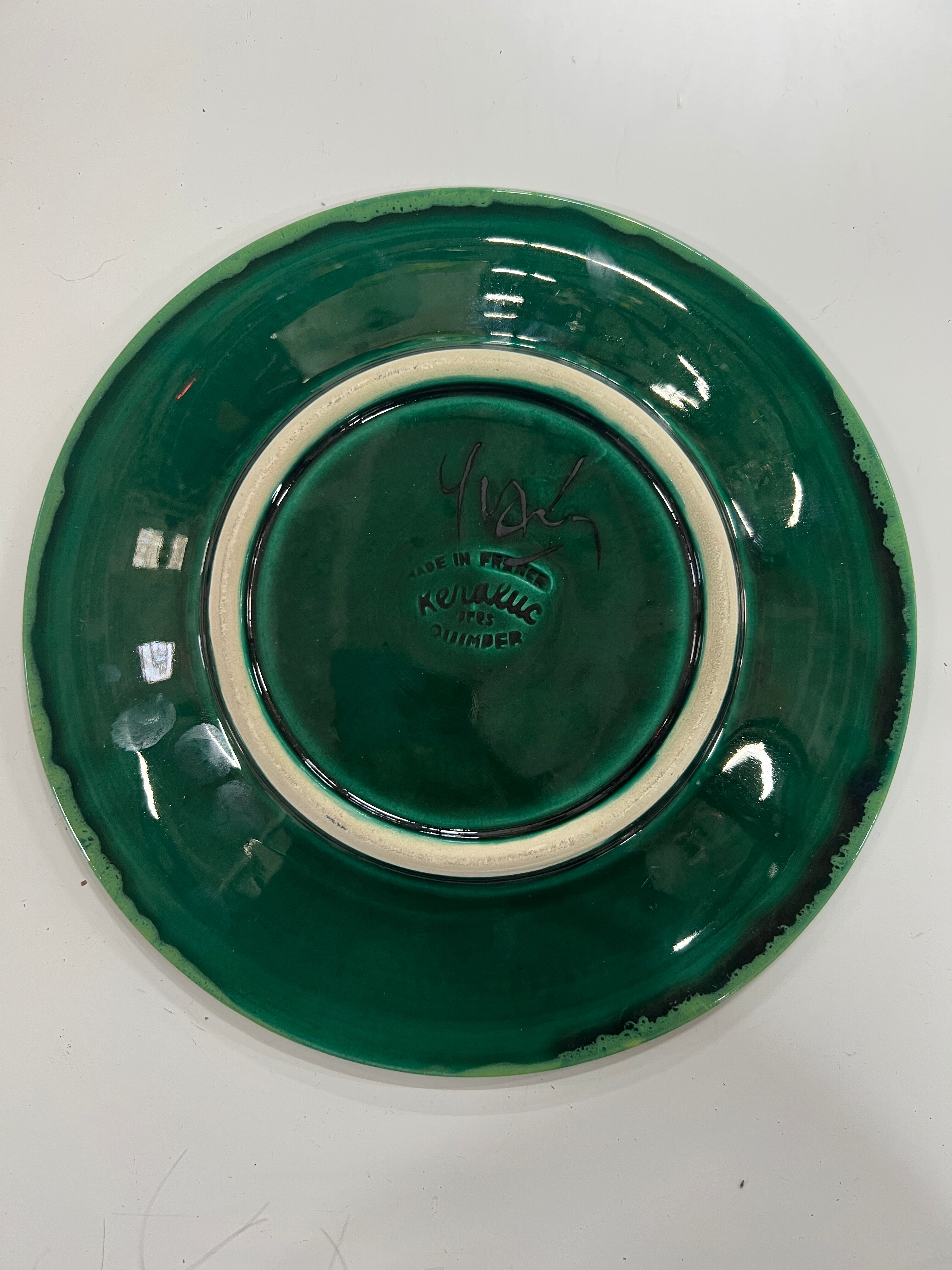 Ceramic plate signed Paul Yvain