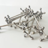 Art deco knife holder in silver metal