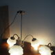 Suspension with 3 brass lights and a white glass globe from the 1950s-1960s.