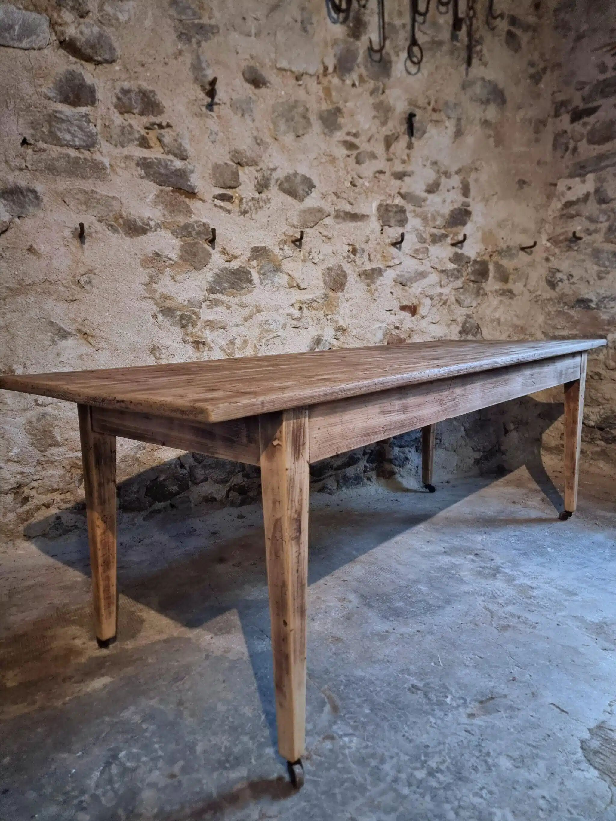 Antique French pine dining table, large farmhouse table on wheels, 19th century.