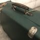 Vintage green case in vulcanized fiber