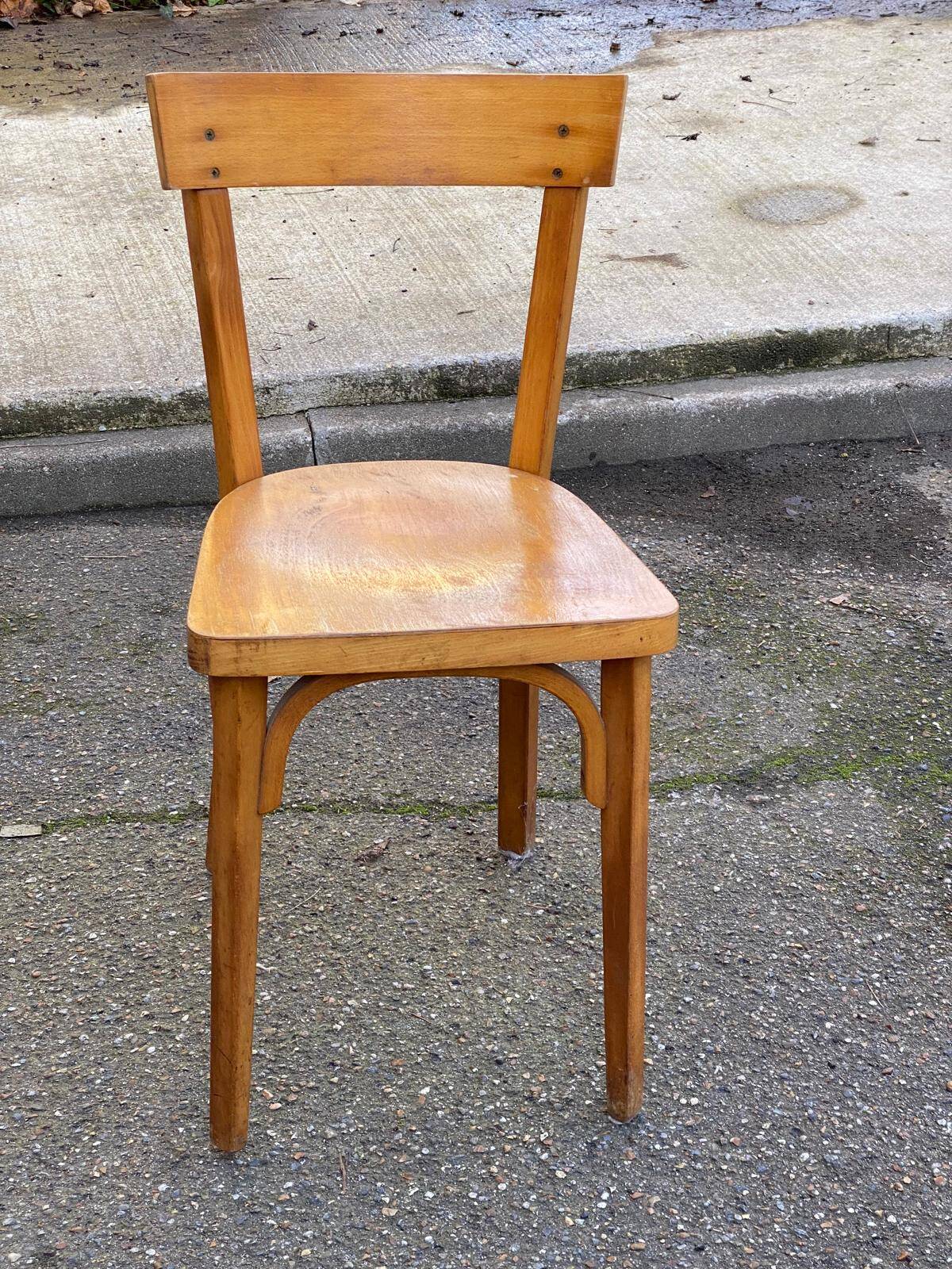 2 Scandinavian bistro chairs by Baumann in light wood from 1980.