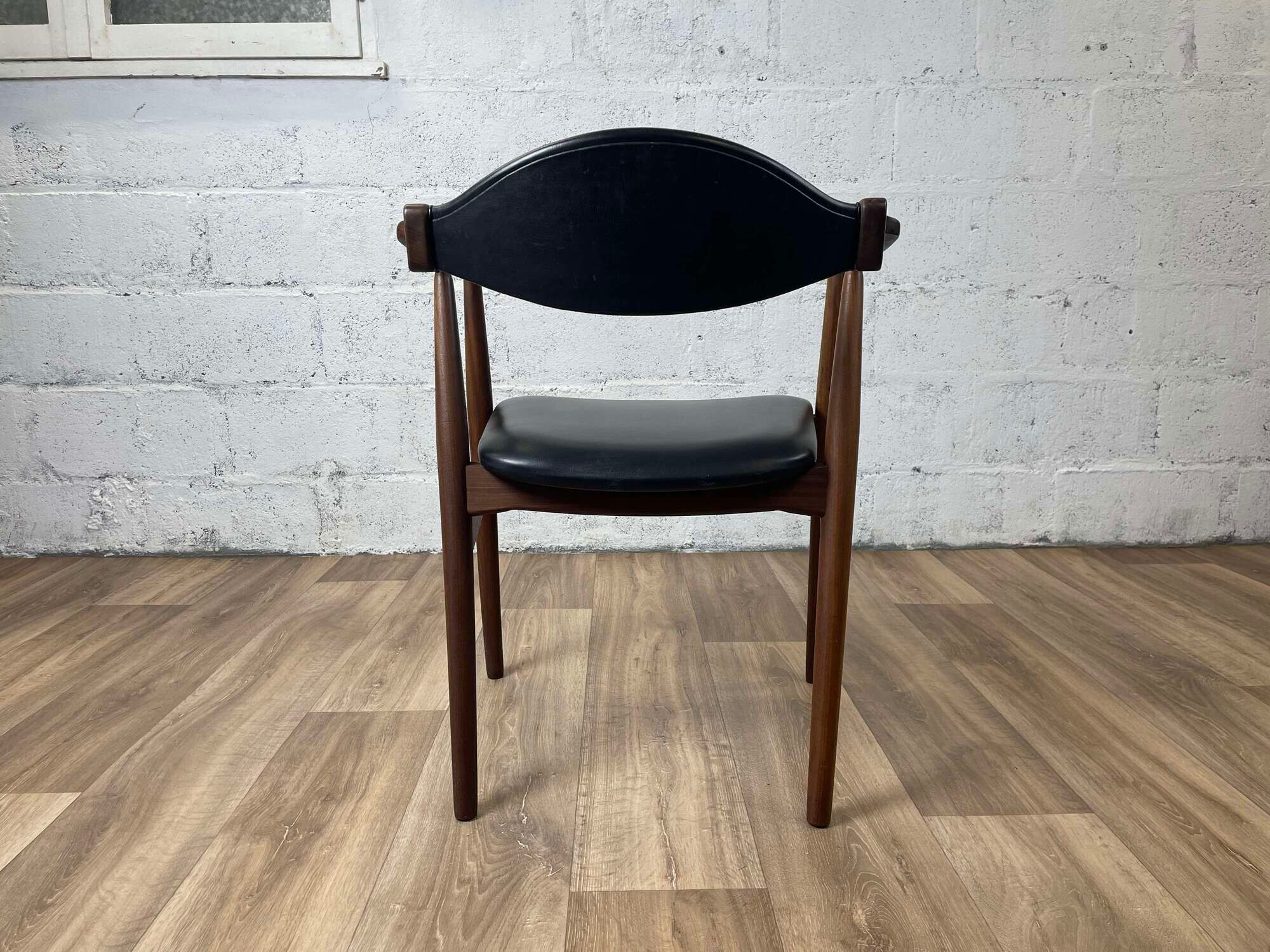 Vintage Scandinavian armchair in teak and black skai, 60s