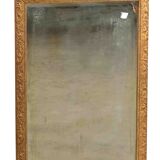 Old mirror in gilded wood