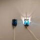 Wall lamps made of black cast iron and handmade thick pressed blue glass