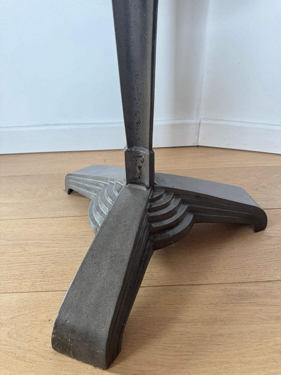 Rare Louis Vuitton cast iron bistro table with a bakelite top.