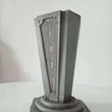 Old art deco vase in cast aluminum