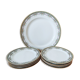 Ensemble de 8 assiettes à dessert et un plat Limoges