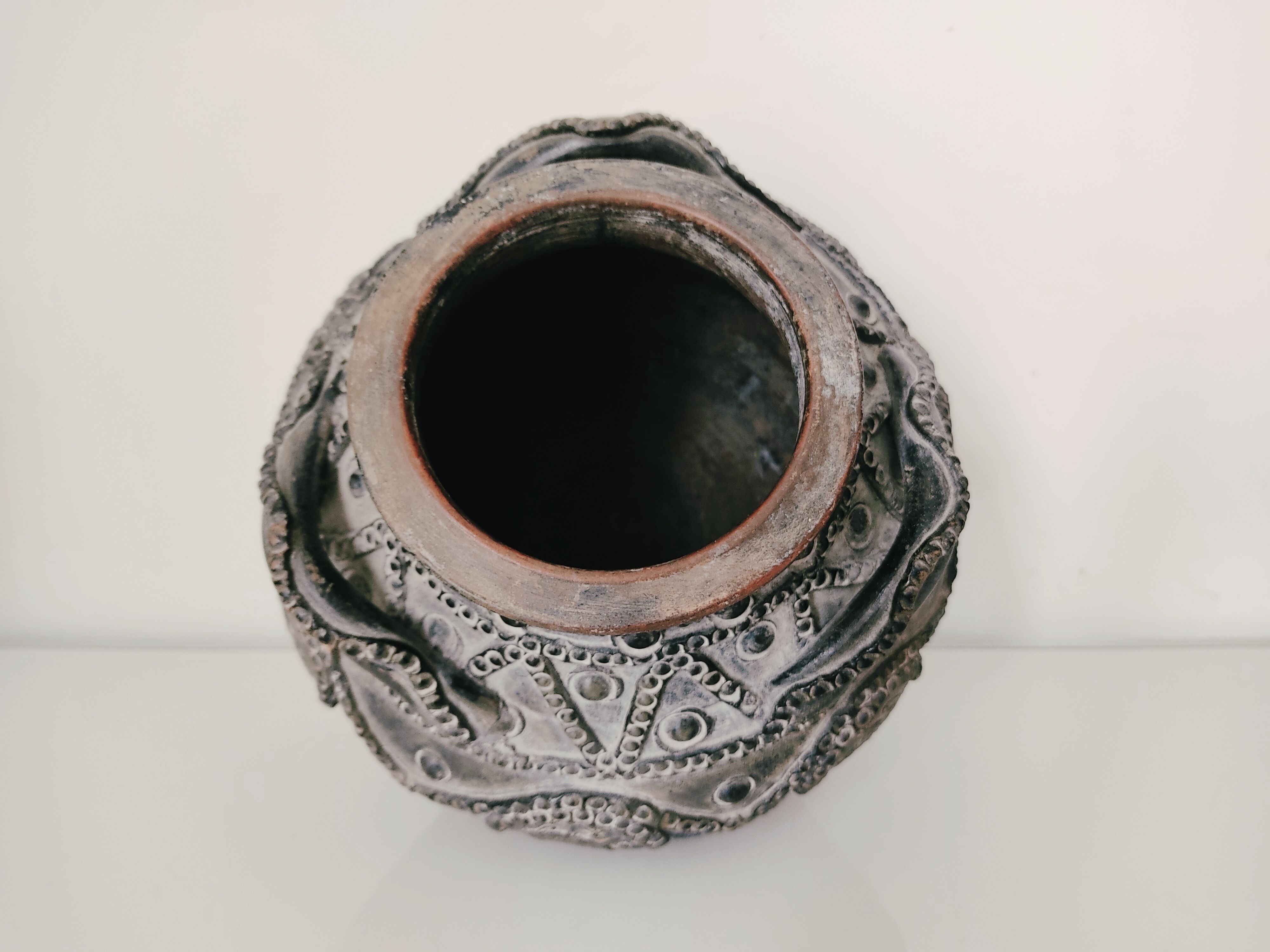 Terracotta vase with decoration astrological signs