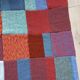 Plaid en patchwork tricoté main