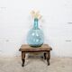 Antique footstool with rustic charm