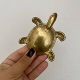 Vintage brass turtle pocket emptier