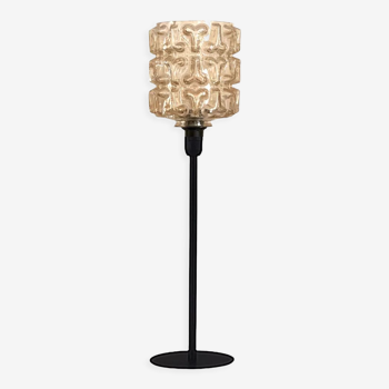 Table lamp with a vintage golden lampshade