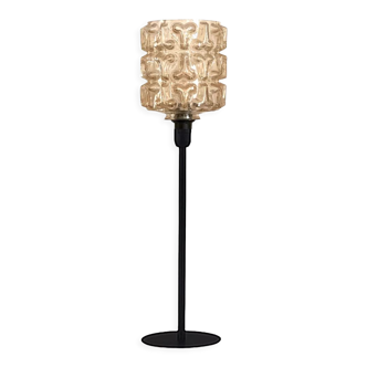 Table lamp with a vintage golden lampshade
