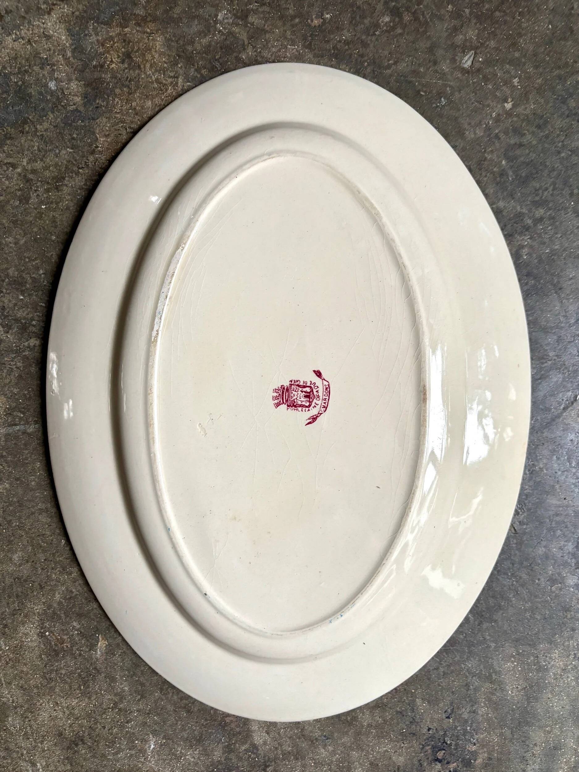 Gien oval dish in pink ironstone, "Chardons" service