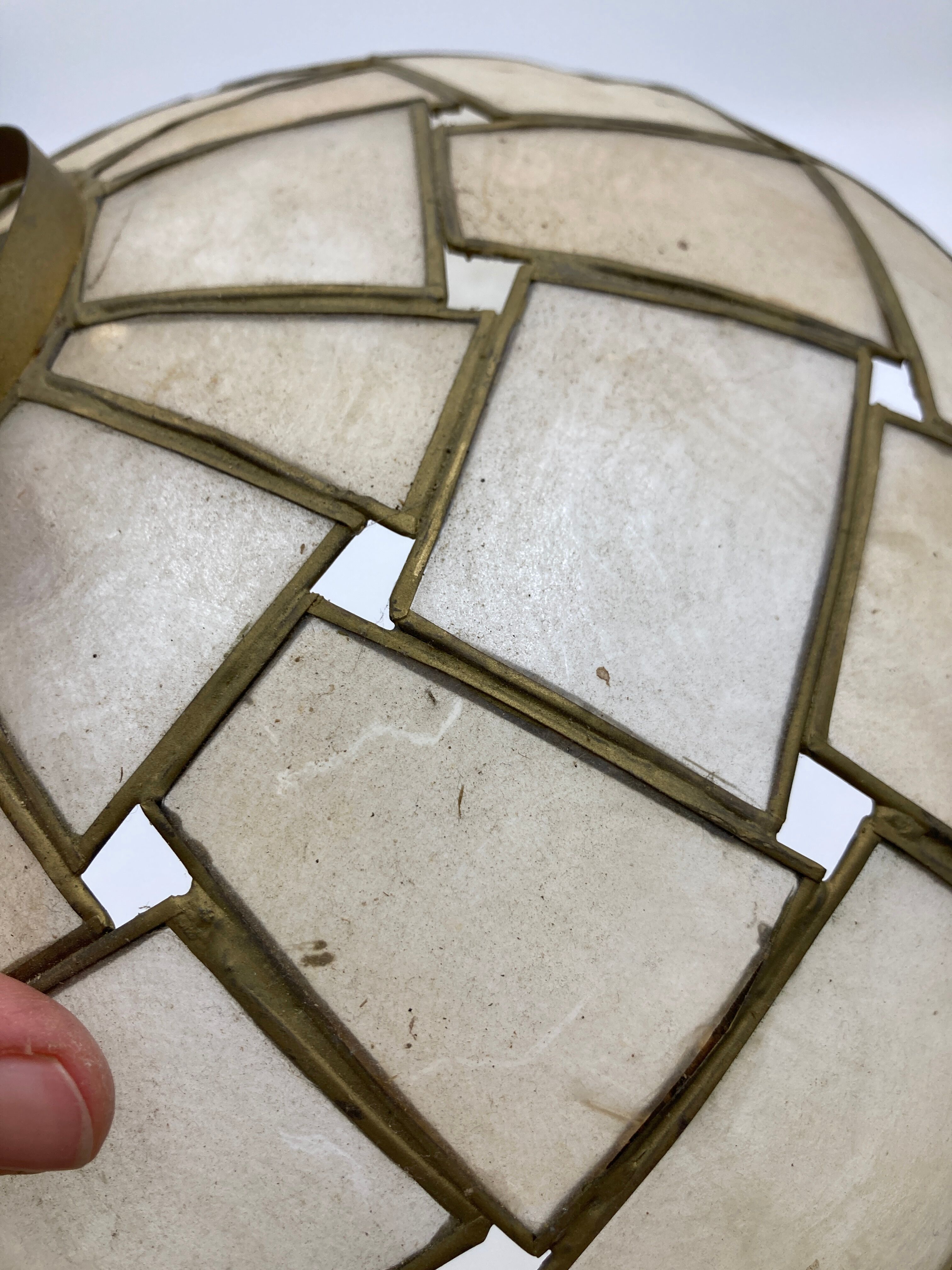 Suspension in geometric mother-of-pearl