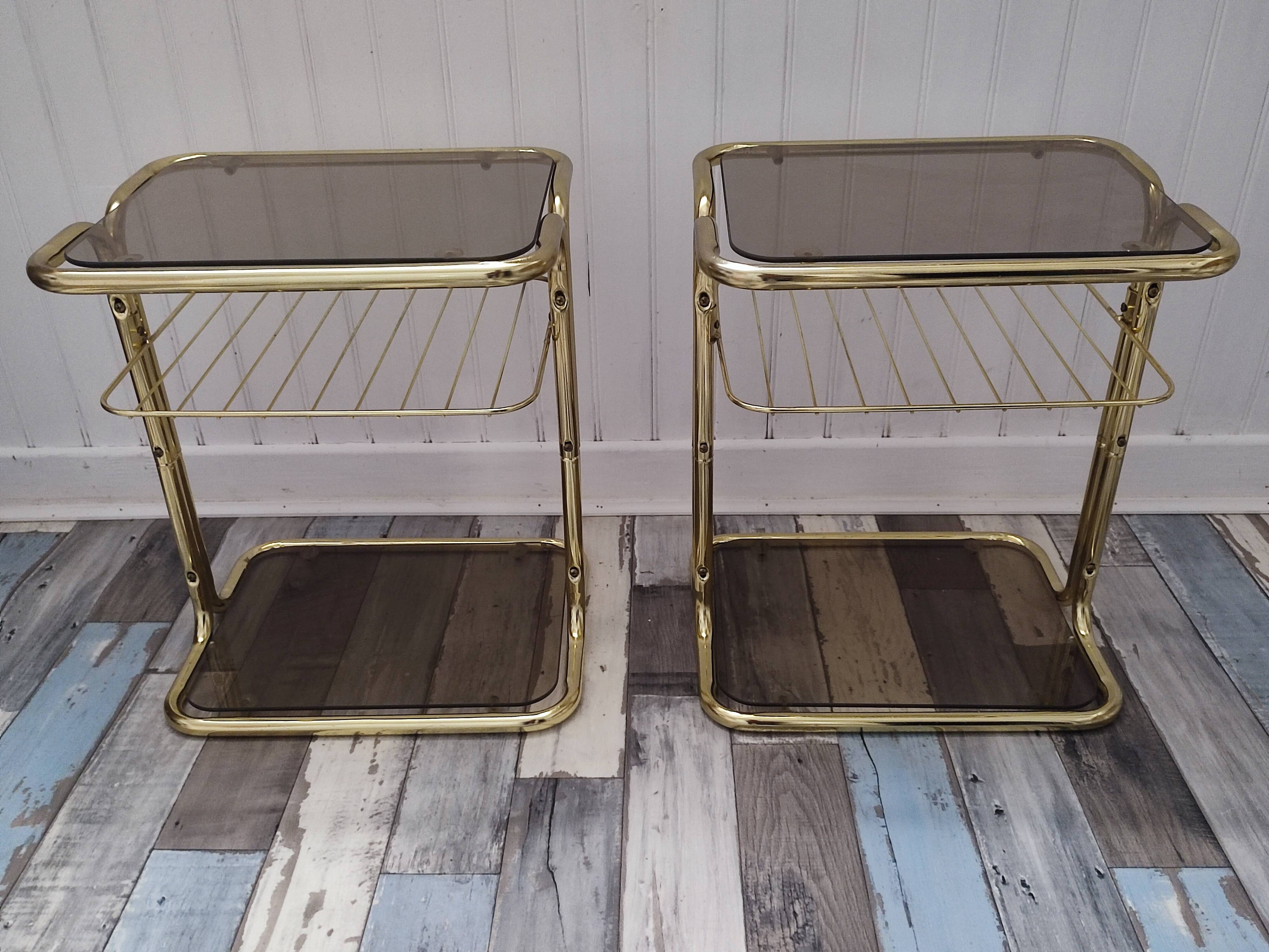 Pair of vintage smoked glass and brass bedside tables
