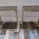 Pair of vintage smoked glass and brass bedside tables