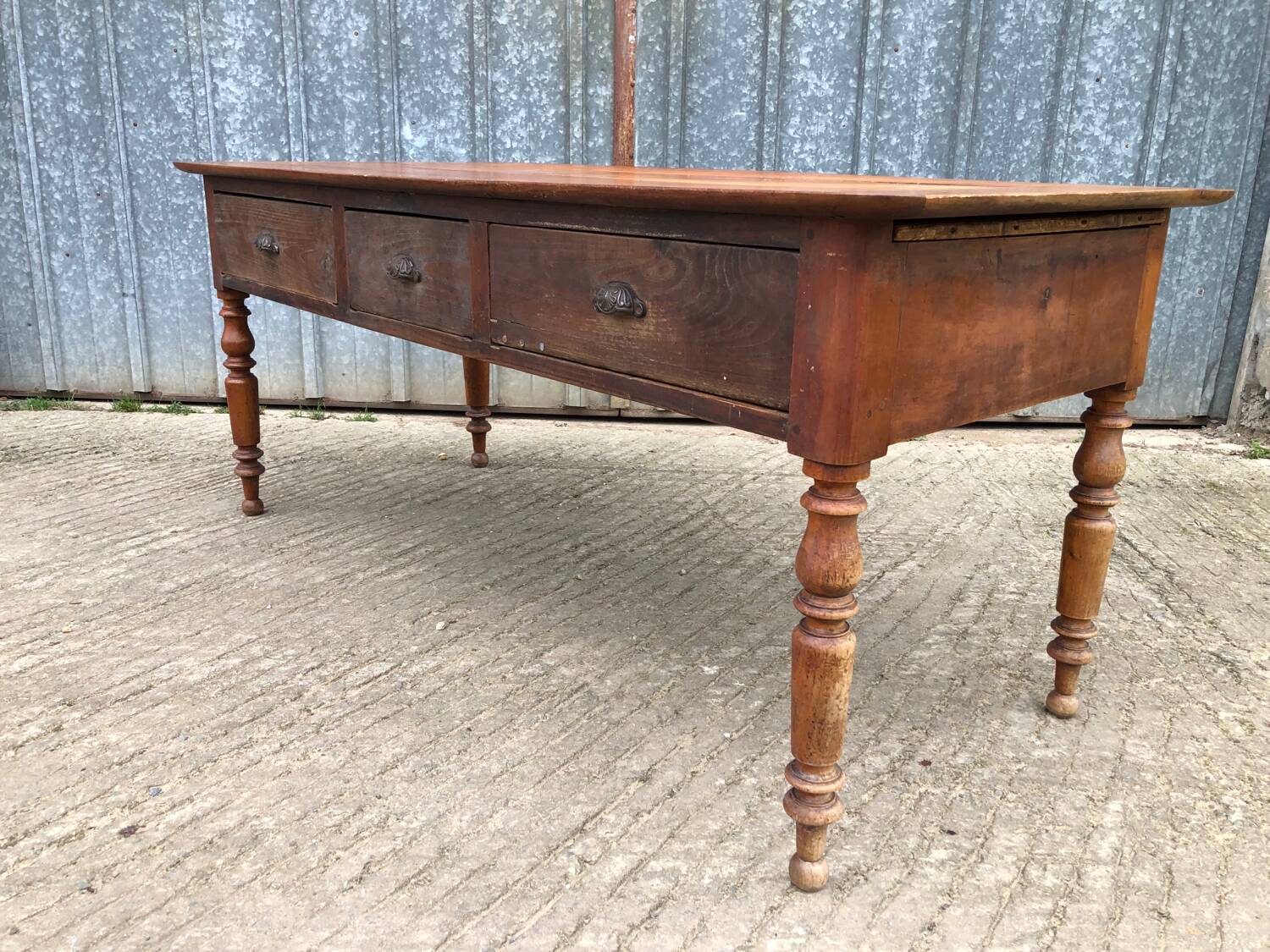 Antique Louis Philippe table in solid cherry and oak with 3 drawers