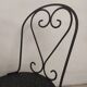 4 black garden chairs