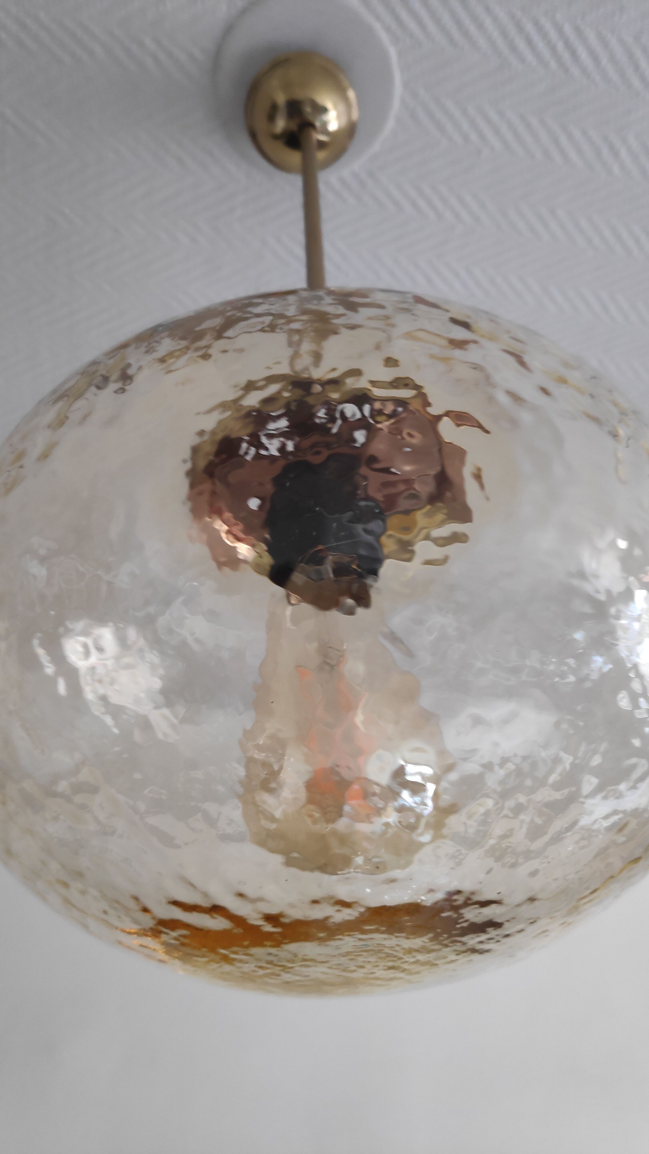 Vintage suspension globe in amber glass
