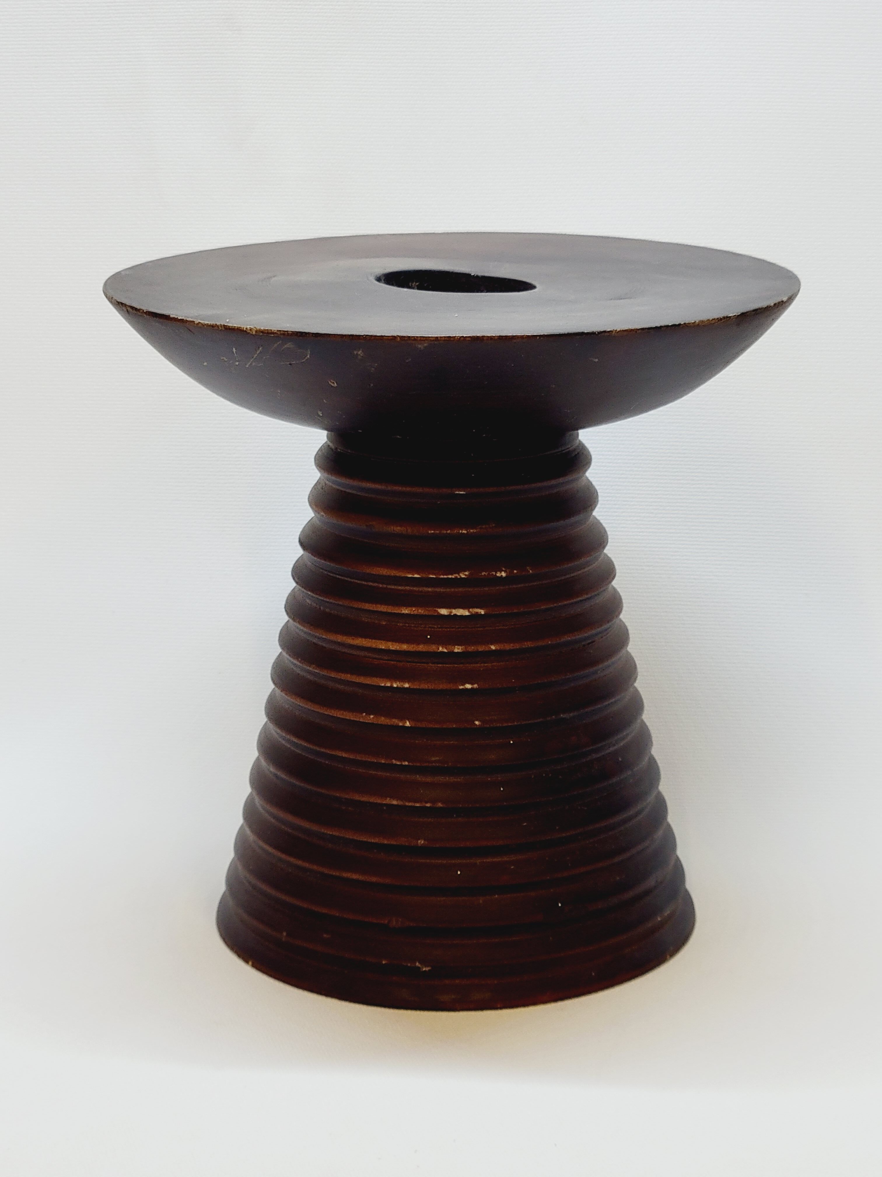 Scandinavian wooden candle holder turned sleek design