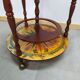 Meuble bar globe en bois sur roulette