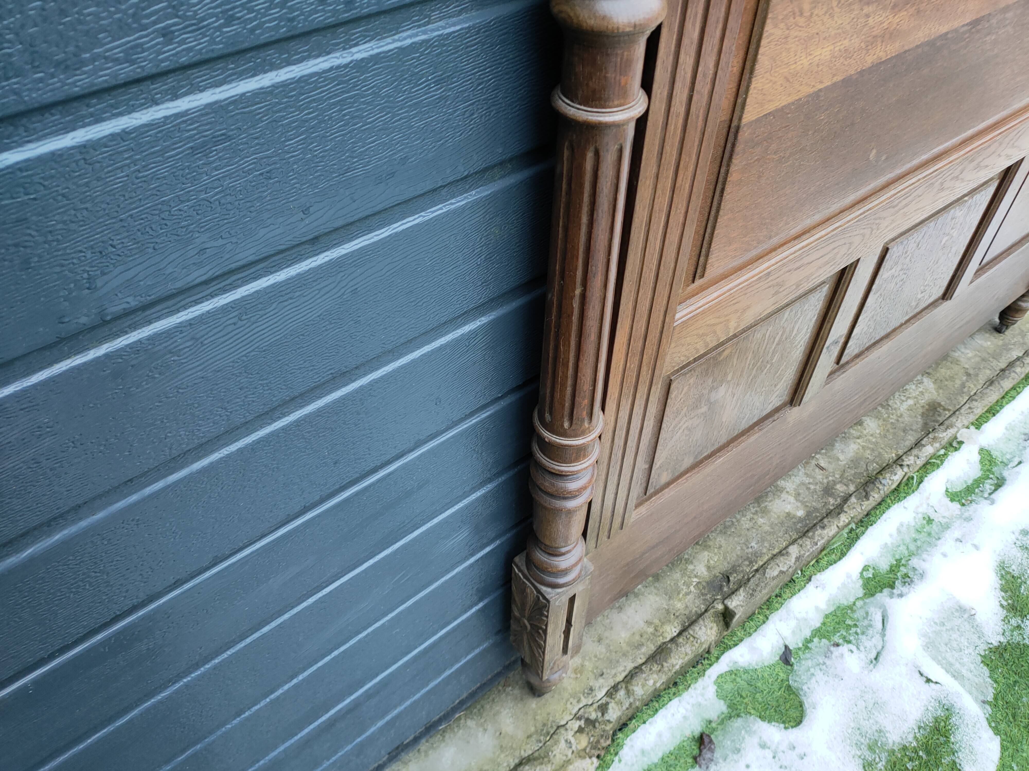 Antique headboard in solid oak