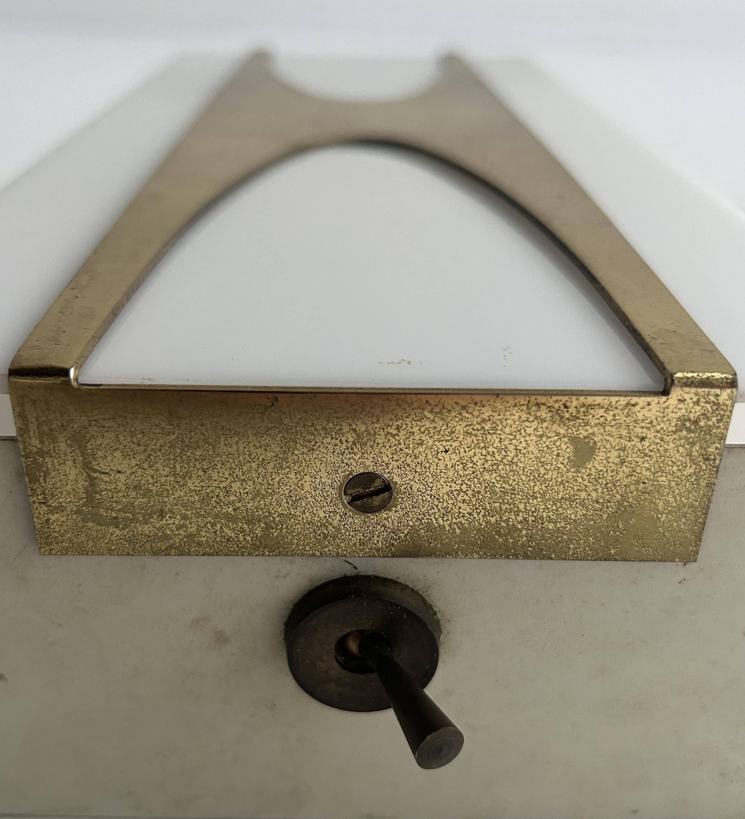 Pair of Loewy wall lights for Hilton, brass and Perspex, France 1965