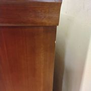 Wooden chest of drawers with a secret drawer