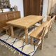Solid oak extendable farmhouse table with 2 drawers.