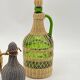 Trio bottles / lady Jeanne, dressed in wicker, rattan, natural fibers